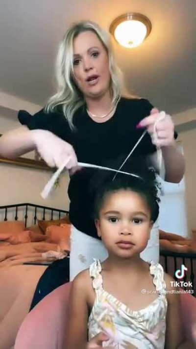 This woman has taken classes to make her daughter's hair and look how happy they are when it's looking good