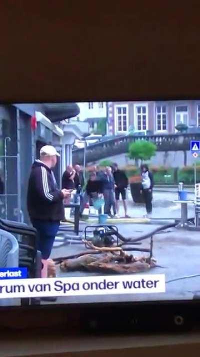 WCGW not paying attention to someone throwing buckets of water
