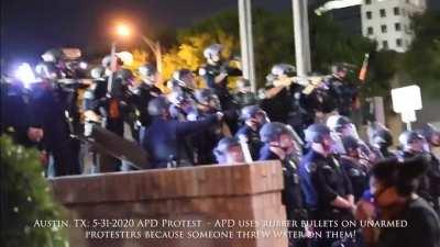APD gets water splashed on them and immediately fires into the crowd.