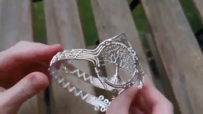 This is a tree armband I made with wire and labradorite beads.