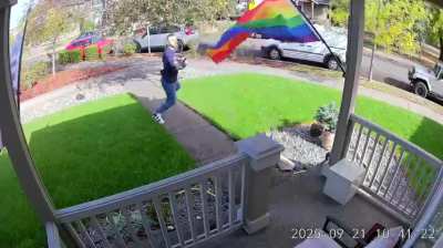Terrified man accidentally brushes past a pride flag. He tries to wipe off the gay but it's too late.