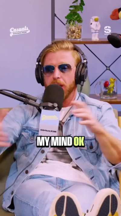 Orange Cassidy explains to Katie Nolan the difference between a piledriver and a tombstone piledriver