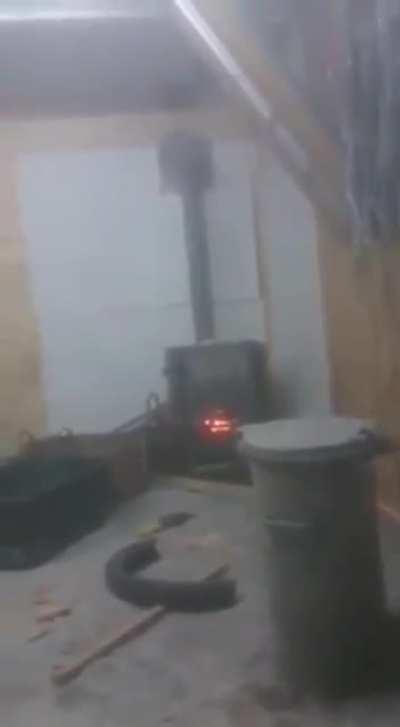 Throwing aerosol can in a wood stove