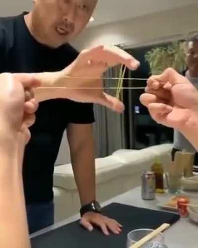 Rubber band sleight of hand