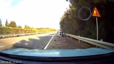 An suv is trying to exit from the passing lane