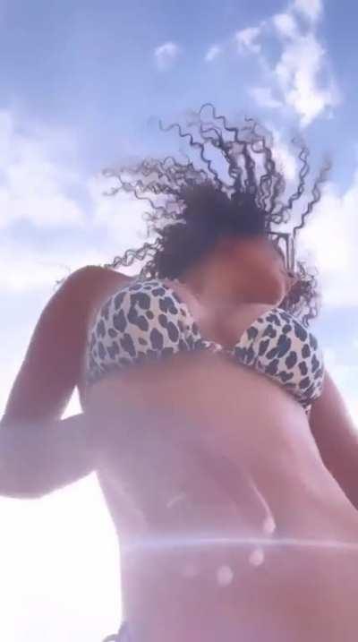 Christina dancing while on vacation