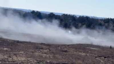 Ukrainian forces use a UR-77 Meteorit vehicle to clear a mined area somewhere in eastern Ukraine