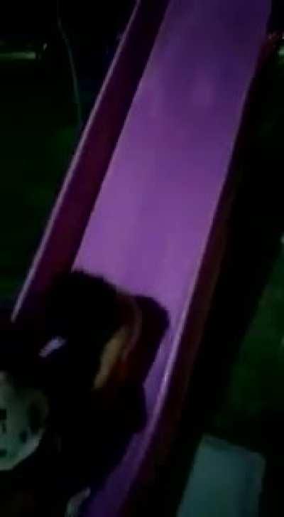 Earlier I posted this video, but it was erased, it is no fake, it happens to my neighboors, their children were playing in a slide and they noted that some kind of face was showed behind their daughter, and there weren’t other children playing