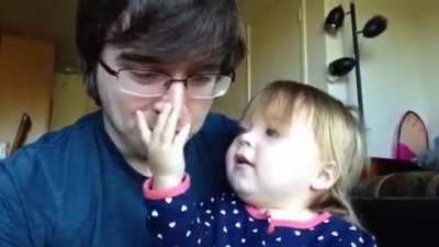 My daughter being brutally honest while examining my nose