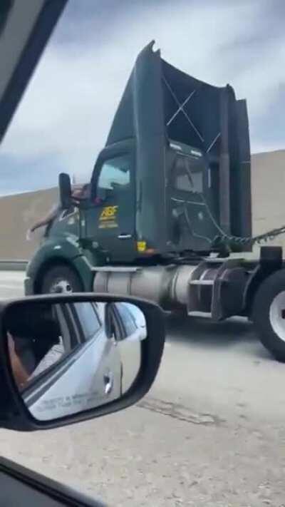 So this guy decided to be a hood ornament. (Don't know why yet, but FHP showed up and arrested him.)
