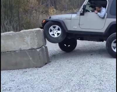 WCGW driving your Jeep on concrete barricade