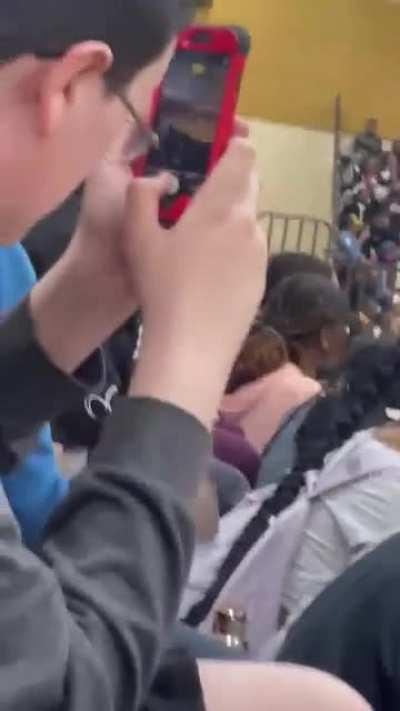 nigga was taking pictures of ass at a pep rally