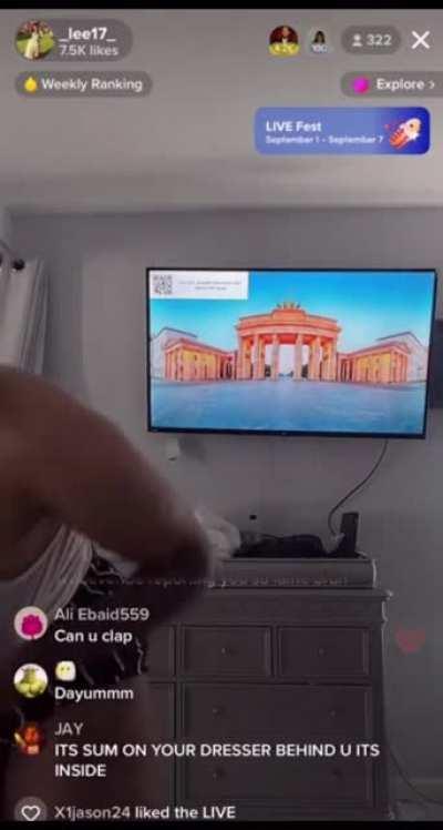 She grabs her nipslip a lil too late