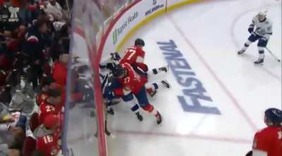 Niko Mikkola receives a 5 minute major and game misconduct for boarding Zemgus Girgensons