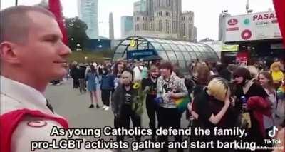 Lgbt mob barks at [gigachad] Catholic preachers in Poland