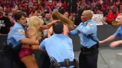 2 years ago today Becky Lynch, Ronda Rousey and Charlotte Flair got arrested and brawled backstage in one of the most chaotic segments in WWE history
