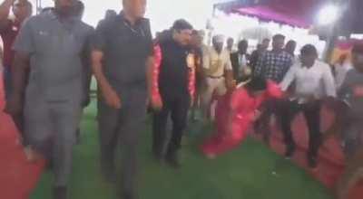 Tamilisai Soundararajan slips and falls at a meeting in Chengalpattu