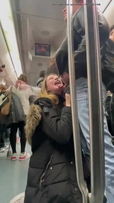 Girl give a blowjob in crowded