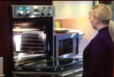 WCGW Cooking a pizza in the oven.