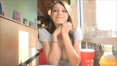 Adorable Girl Flashes Tits at a Restaurant