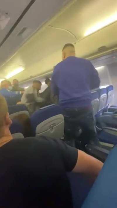 4 v 1 fight on flight from Manchester to Amsterdam today. Pilot had to break it up.