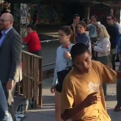 Smooth skater steals beer from bystander