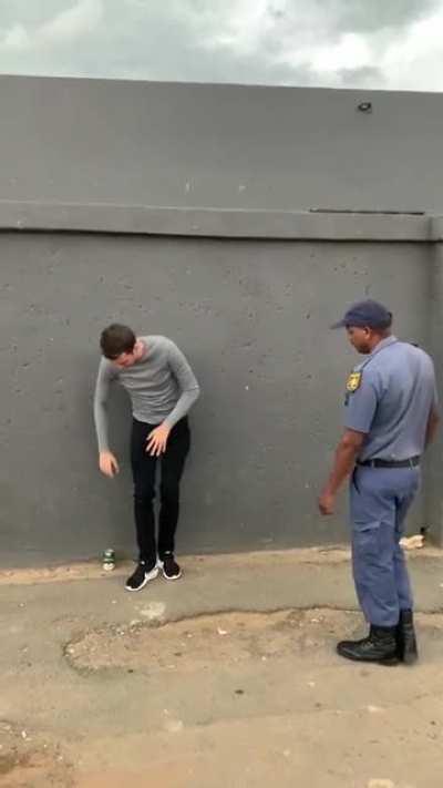 Magician tricks South African policeman