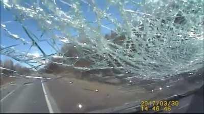 Suzuki driver almost dies from rock