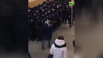 Russian prankster drops toy gun in front of police.