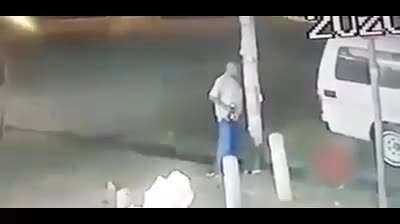 Guy Pees On Electric Pole (Ran Away)