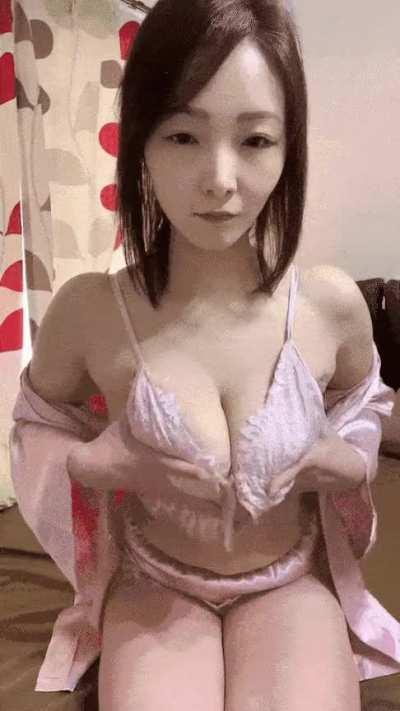 Japanese beauty playing with her tits..... all i have to say....