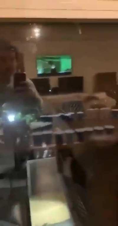 Guys in apartment express support for protesters, proceeds to get windows smashed.