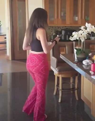 Alex Botez in red flare leggings