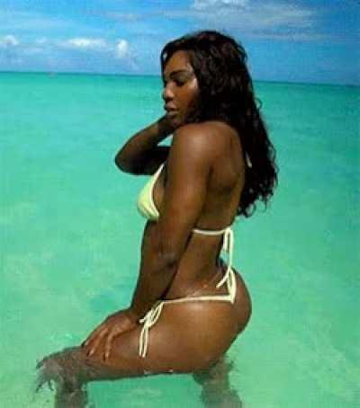 Serena Williams posing in a thong bikini