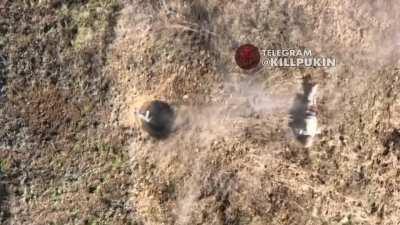 A Ukrainian drone baiting a Russian soldier out of his foxhole with a grenade and hitting him with another grenade