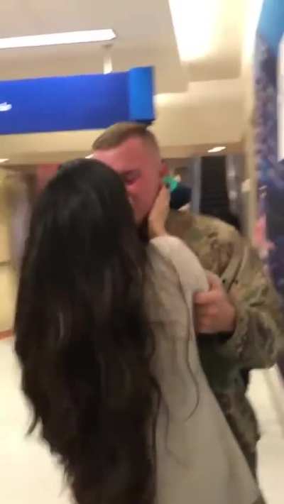 Soldier at Texas Airport holding his baby for the first time!