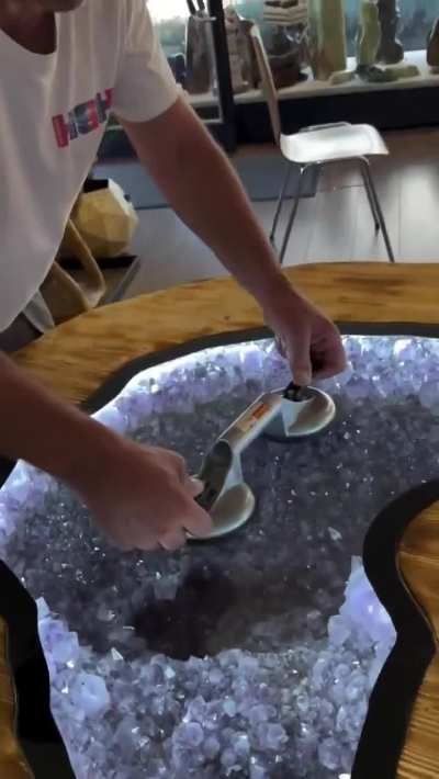 Amethyst geode carved in a table