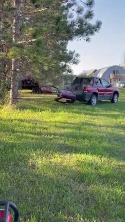 When your friend gets a good idea to uproot a tree with your SUV (now a pickup)