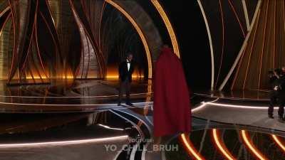 Doctor Strange punches Chris Rock out his body