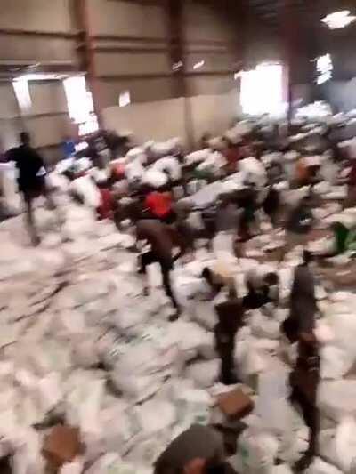 A warehouse full of hoarded covid relief items and palliatives discovered by Nigerian citizens in festac Lagos.