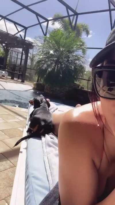 Peyton chilling by the pool 🔥