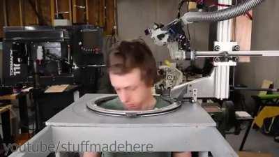 A robot that cuts hair with scissors