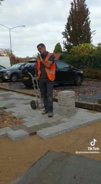 Polish man raving while paving in Netherlands