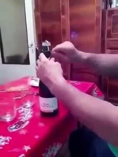 Popping open champagne under light bulb