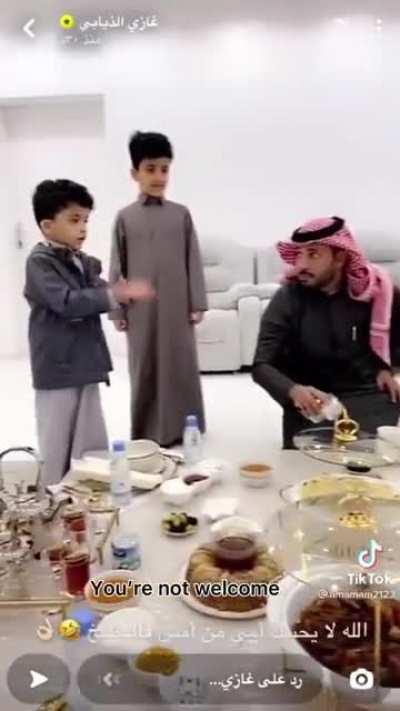 Little homie standing up for his mama