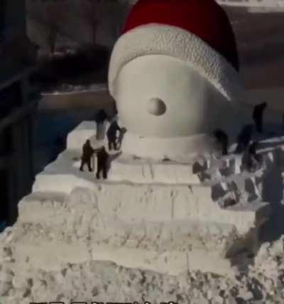 Builders in China Create a Massive Snowman For Their Festival in Harbin China