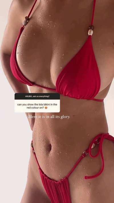 Emily Feld wet in bikini