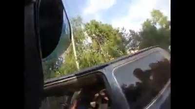 Biker gets bumped on purpose, chases down driver and gives him a beating