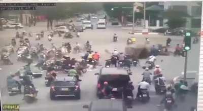 Car runs over 17 bikes and wounds 22 at an intersection in Vietnam