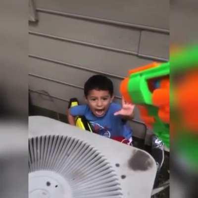 Kid freaks out over a nerf gun